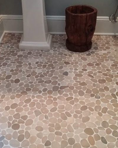 Bathroom - small transitional 3/4 pebble tile floor and brown floor bathroom idea with gray walls and a pedestal sink