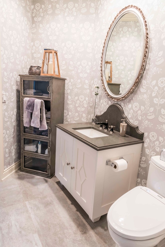 Mid-sized transitional 3/4 medium tone wood floor and brown floor bathroom photo in Calgary with furniture-like cabinets, white cabinets and an undermount sink