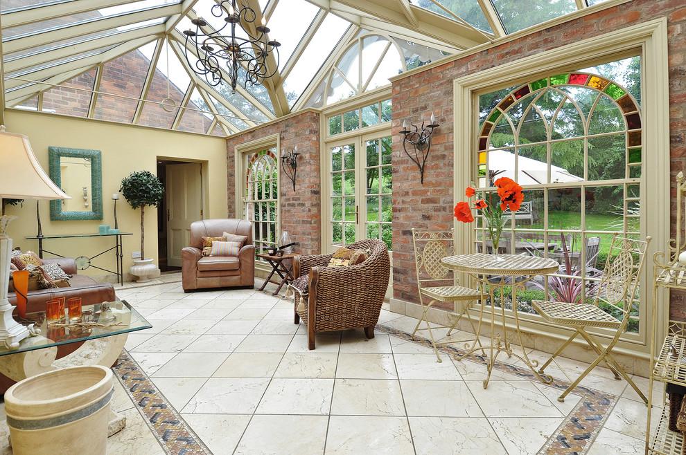 Inspiration for a traditional sunroom in Other with a glass ceiling and limestone floors.