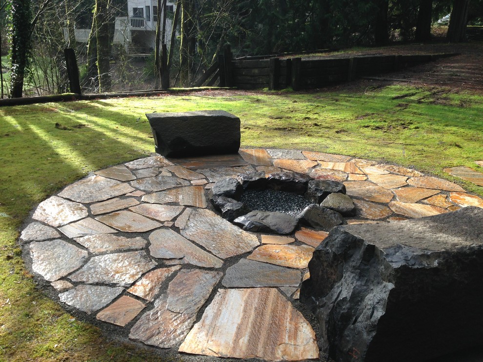 Inspiration for a rustic landscaping in Seattle.