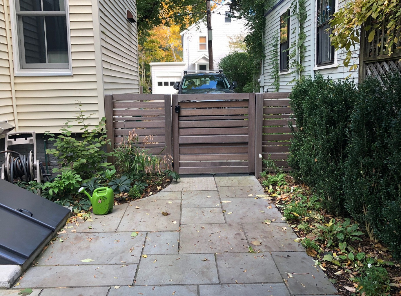 Gate between driveway and rear garden