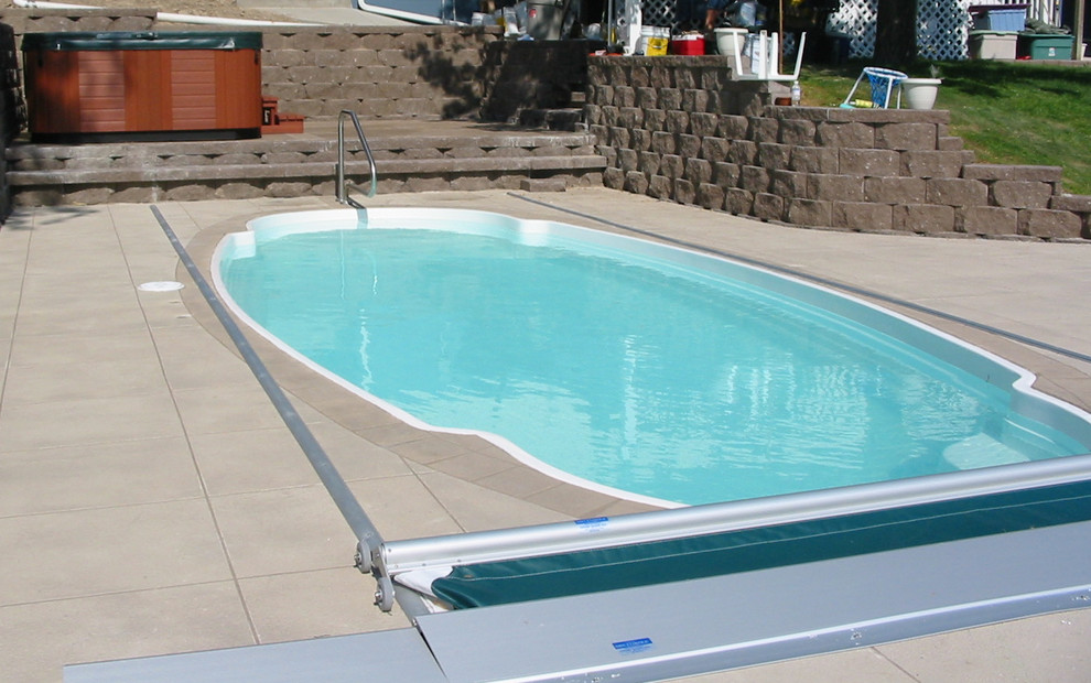 Mid-sized trendy backyard natural pool photo