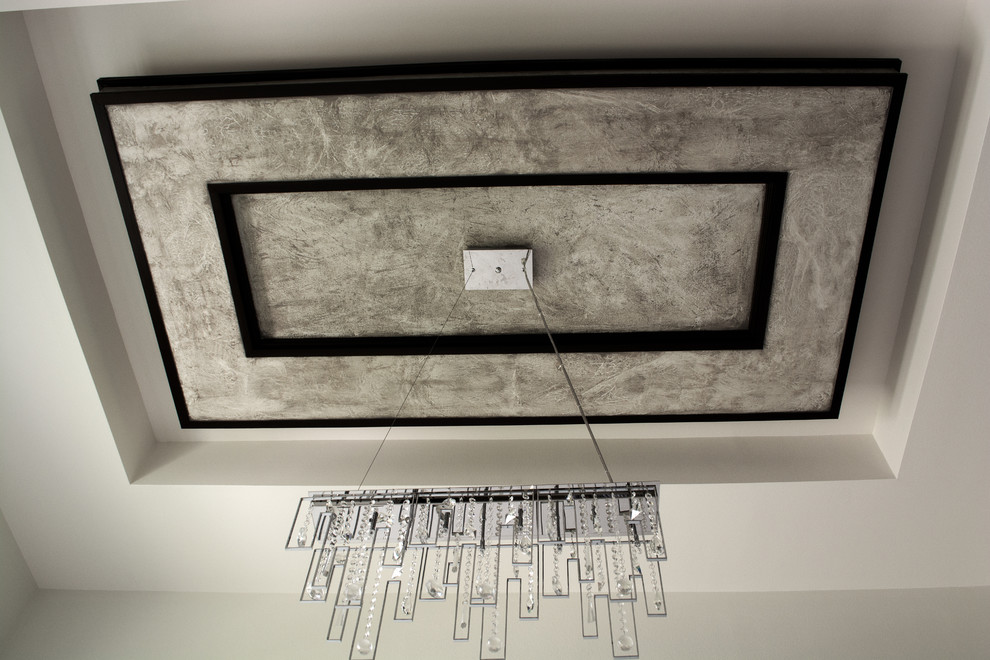 Example of a small transitional home design design in Austin