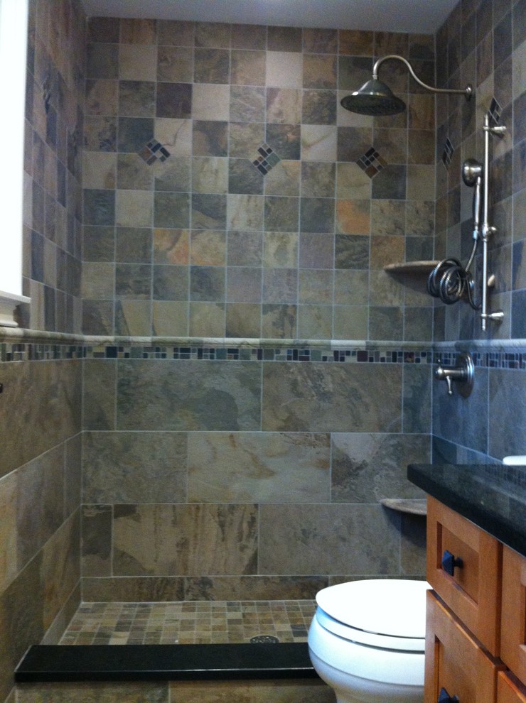 Inspiration for a transitional beige tile and porcelain tile bathroom remodel in New York