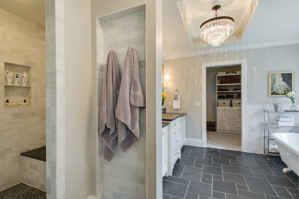 This is an example of a large transitional master bathroom in Minneapolis with recessed-panel cabinets, white cabinets, a claw-foot tub, beige tile, subway tile, beige walls, an open shower, an undermount sink, soapstone benchtops and slate floors.