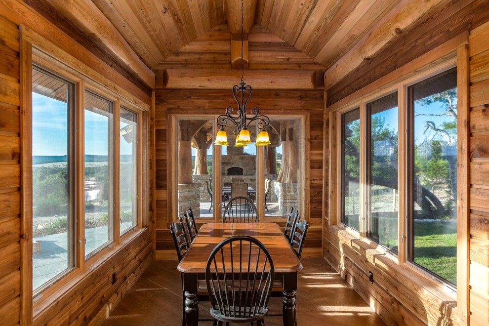 Country dining room in Boise with light hardwood floors.