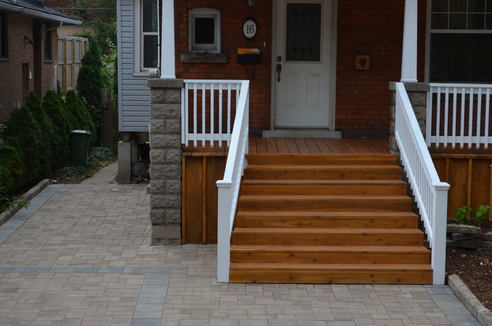Inspiration for a backyard landscaping in Toronto with decking.