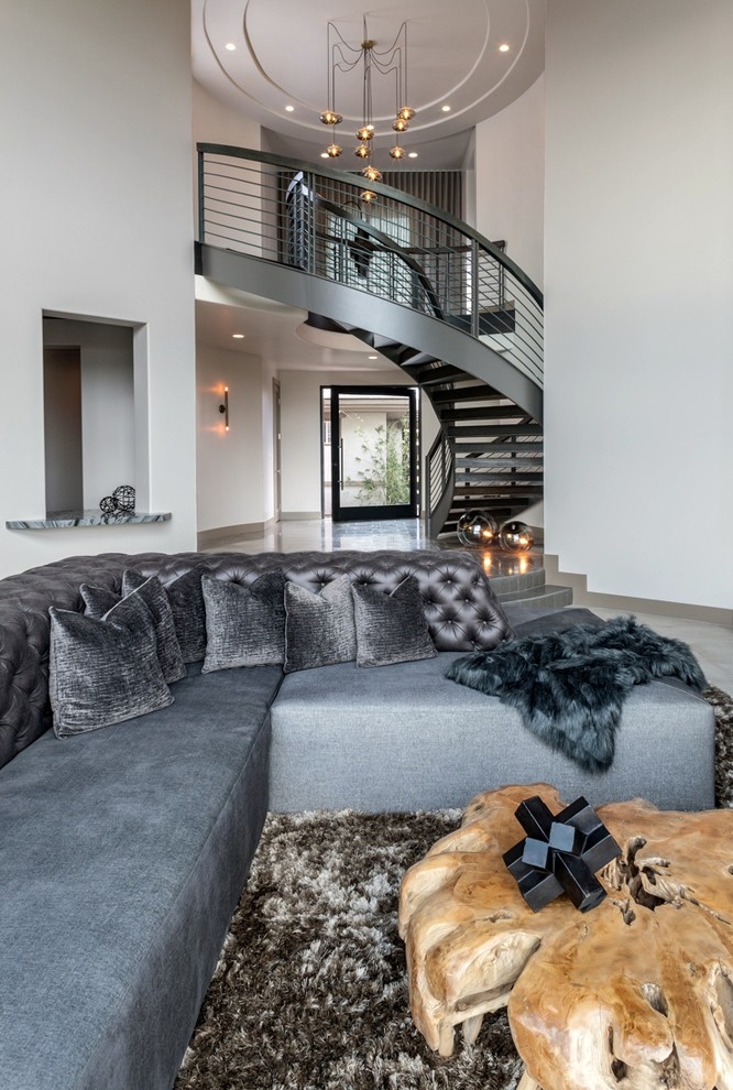 Inspiration for an expansive modern open concept living room in Las Vegas with white walls, concrete floors, a ribbon fireplace, a tile fireplace surround and no tv.
