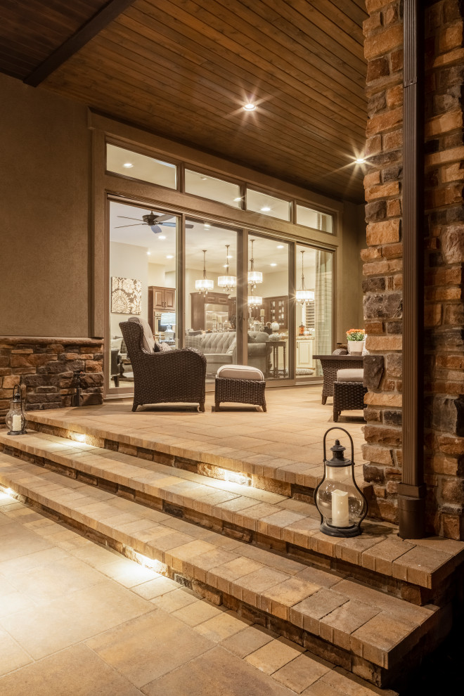 Example of a mountain style home design design in Denver