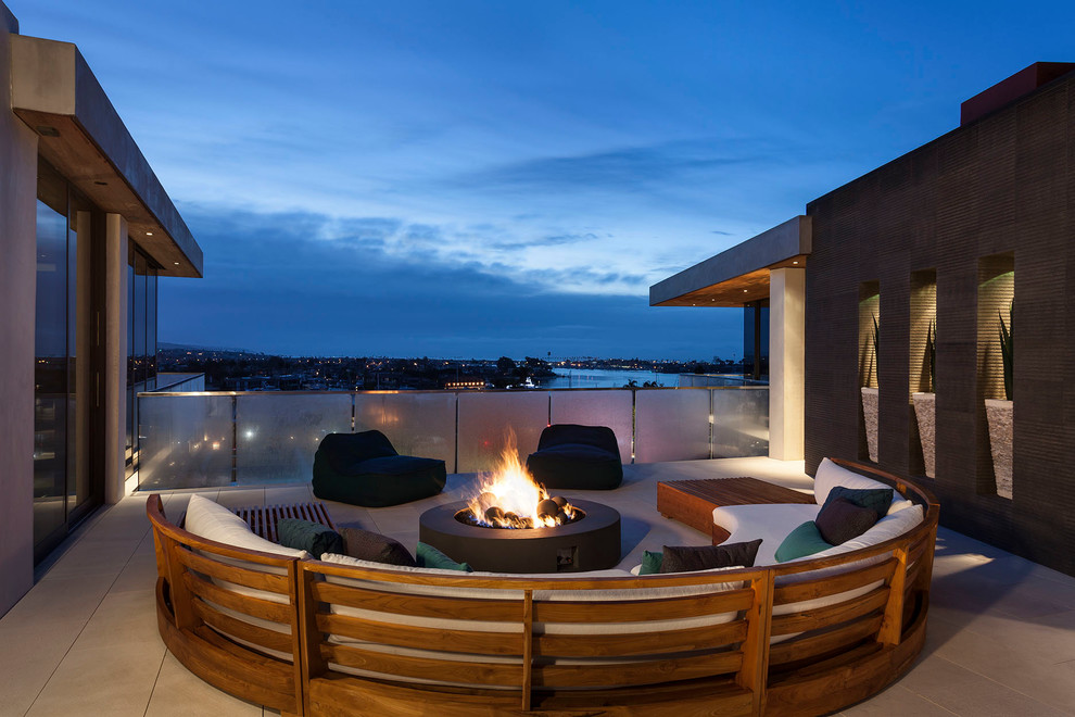 Design ideas for a contemporary deck in Orange County with no cover and a fire feature.