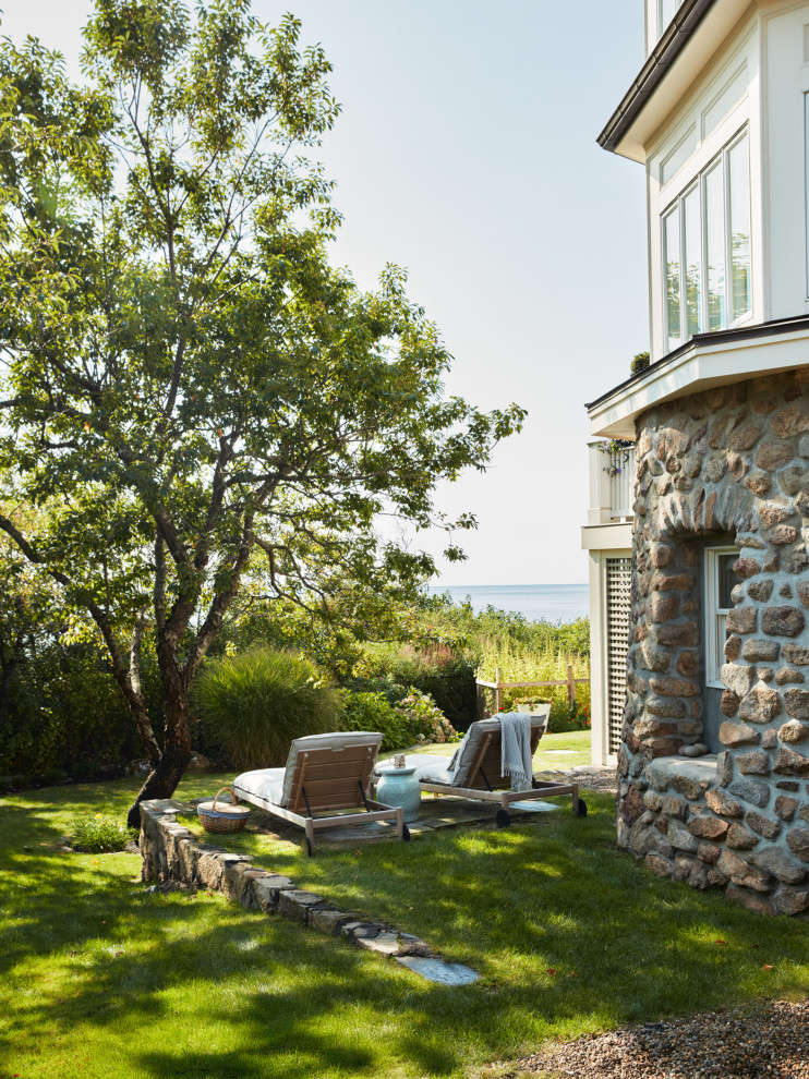Example of a beach style exterior home design in Boston