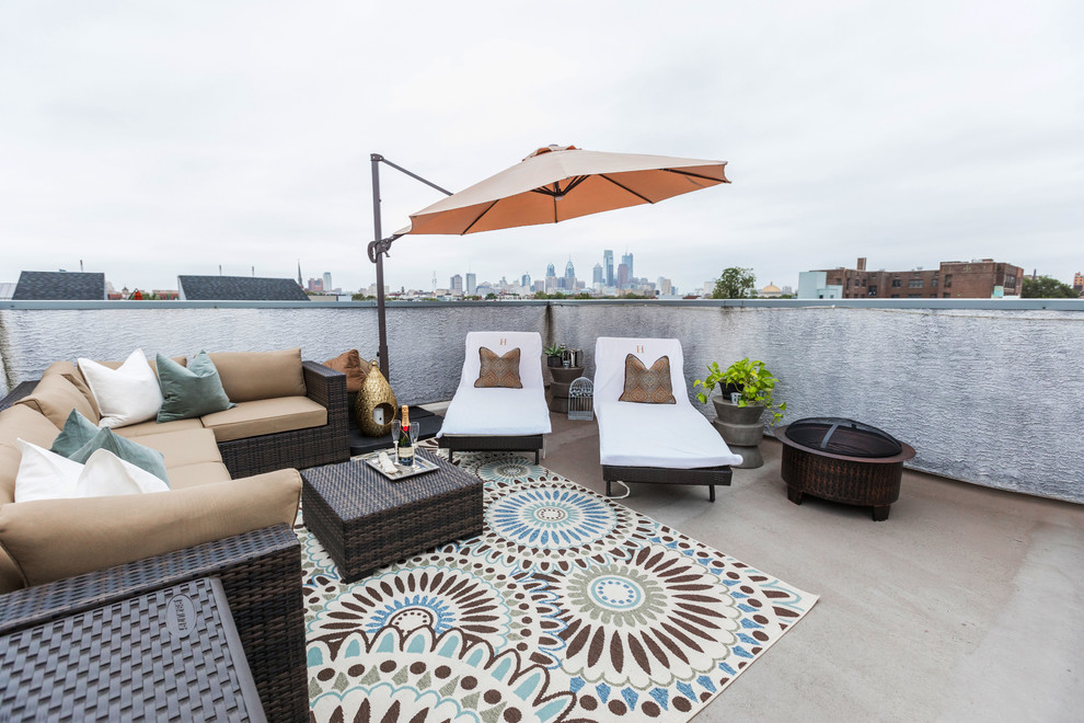 Mid-sized minimalist balcony photo in Philadelphia with no cover