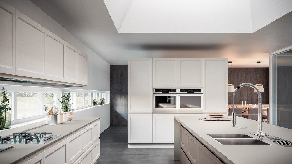 Eat-in kitchen - mid-sized transitional eat-in kitchen idea with shaker cabinets, beige cabinets and an island