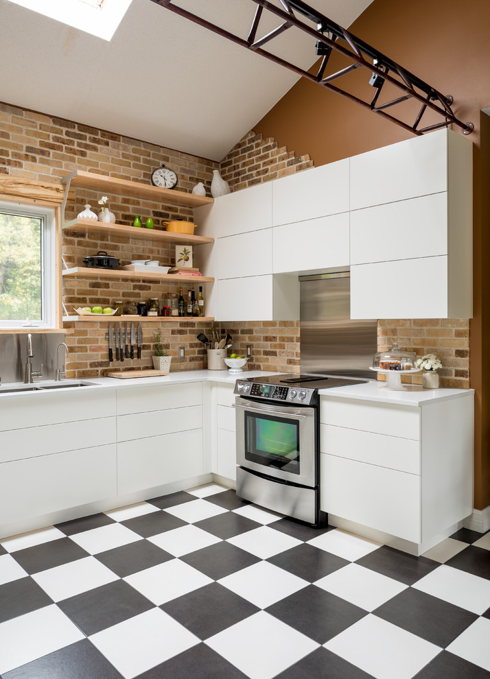 Inspiration for a mid-sized industrial u-shaped eat-in kitchen in Toronto with a double-bowl sink, flat-panel cabinets, white cabinets, quartz benchtops, multi-coloured splashback, stone tile splashback, stainless steel appliances, ceramic floors and no island.