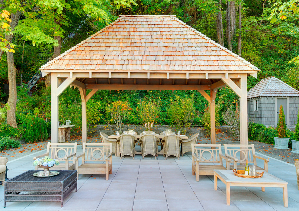 Inspiration for a traditional patio in Seattle with a gazebo/cabana.