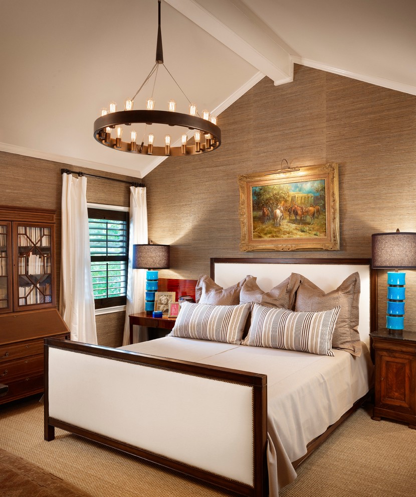 This is an example of a contemporary bedroom in Austin with beige walls.
