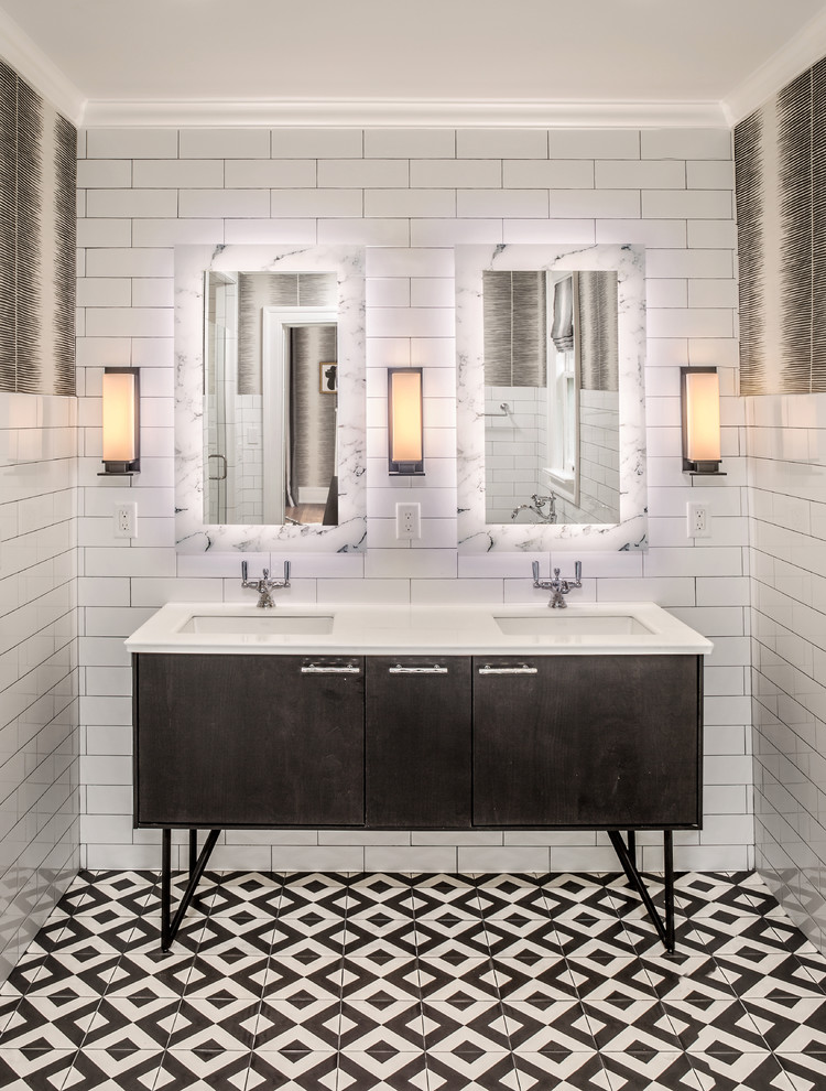 Photo of a small contemporary master bathroom in Milwaukee with dark wood cabinets, white tile, subway tile, white walls, an undermount sink, marble benchtops, multi-coloured floor and flat-panel cabinets.