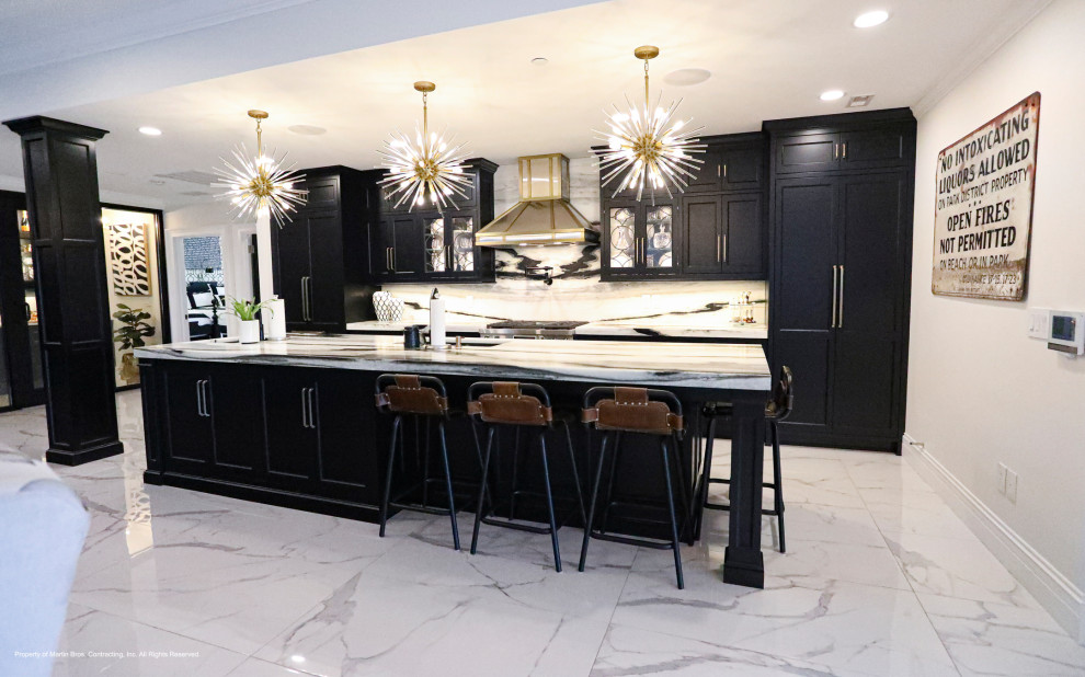 Inspiration for a mid-sized transitional porcelain tile and white floor open concept kitchen remodel with an undermount sink, recessed-panel cabinets, black cabinets, marble countertops, marble backsplash, stainless steel appliances and an island