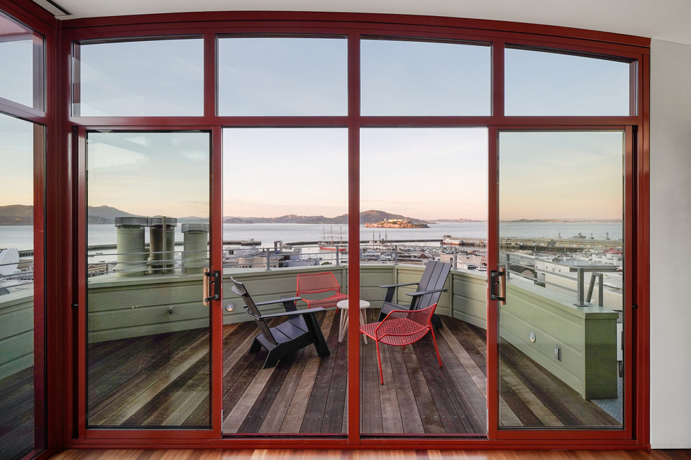 Large eclectic rooftop and rooftop deck in San Francisco with no cover.