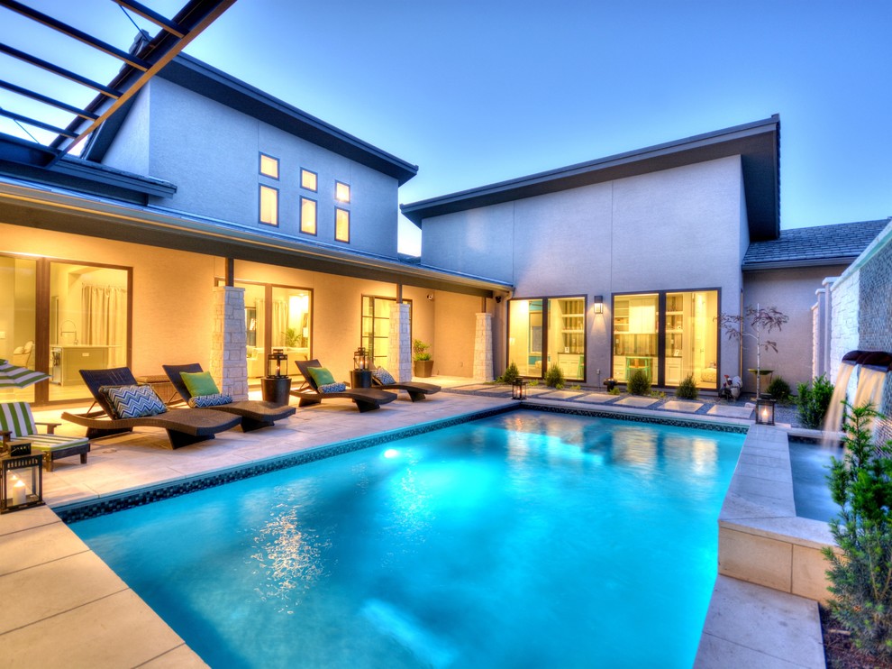Mid-sized contemporary pool in Austin.