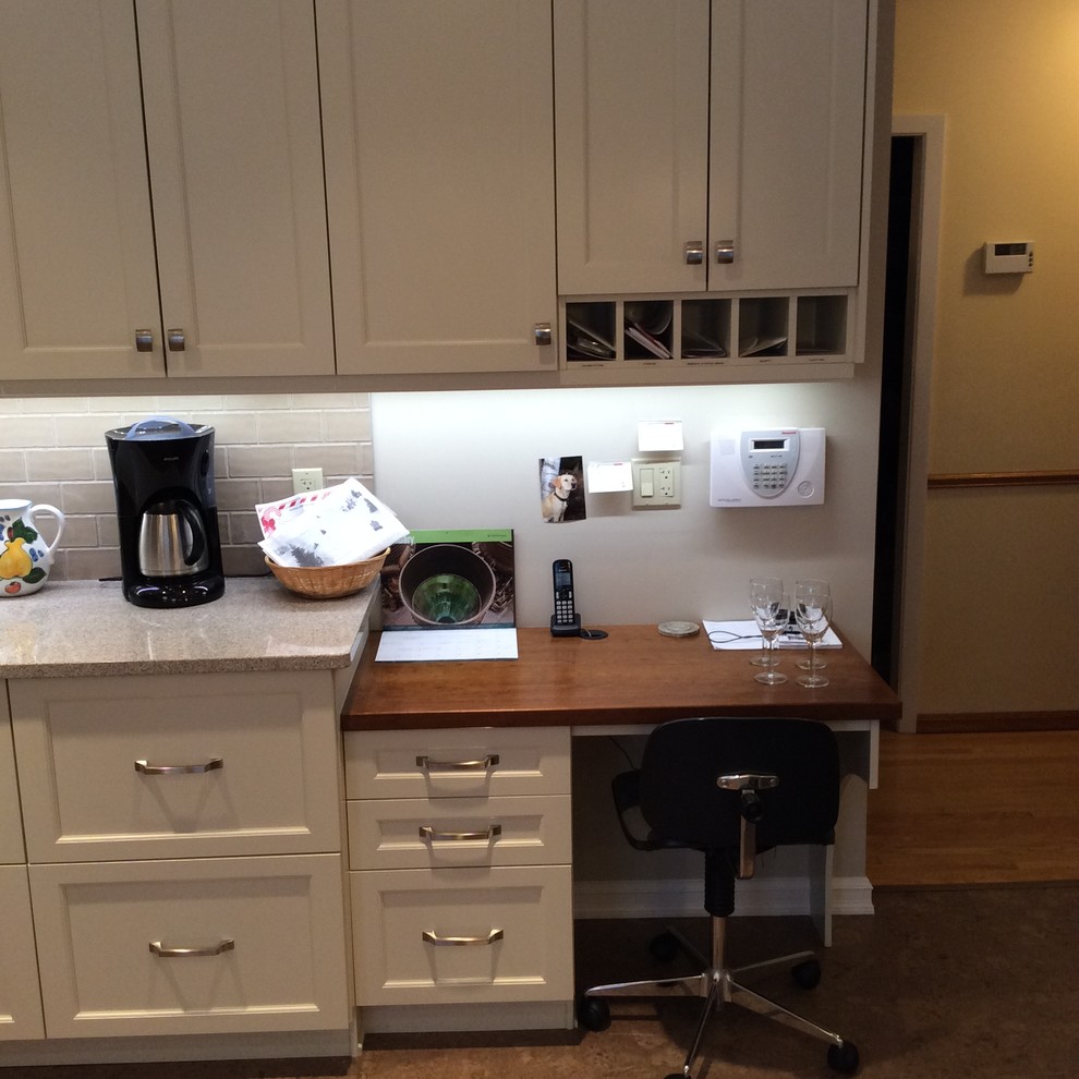 Kitchen - transitional cork floor kitchen idea in Edmonton with white cabinets, quartzite countertops, gray backsplash, ceramic backsplash and stainless steel appliances