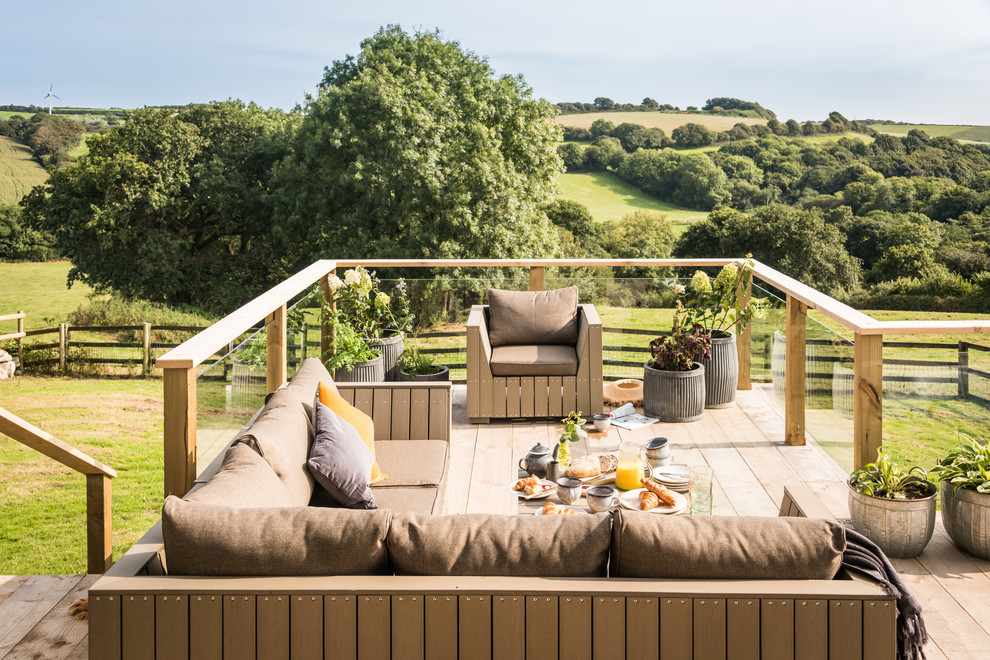 Photo of an expansive traditional backyard full sun garden for summer in Cornwall with decking.