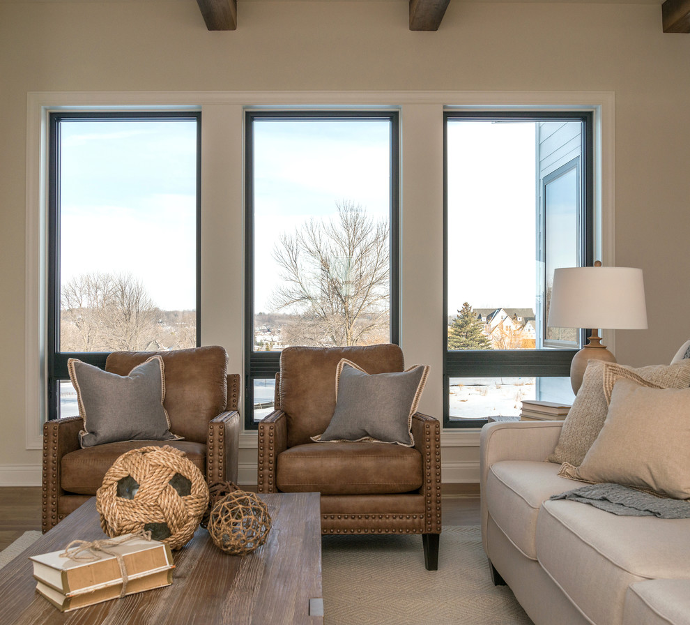 Transitional open concept living room in Minneapolis with dark hardwood floors and a built-in media wall.