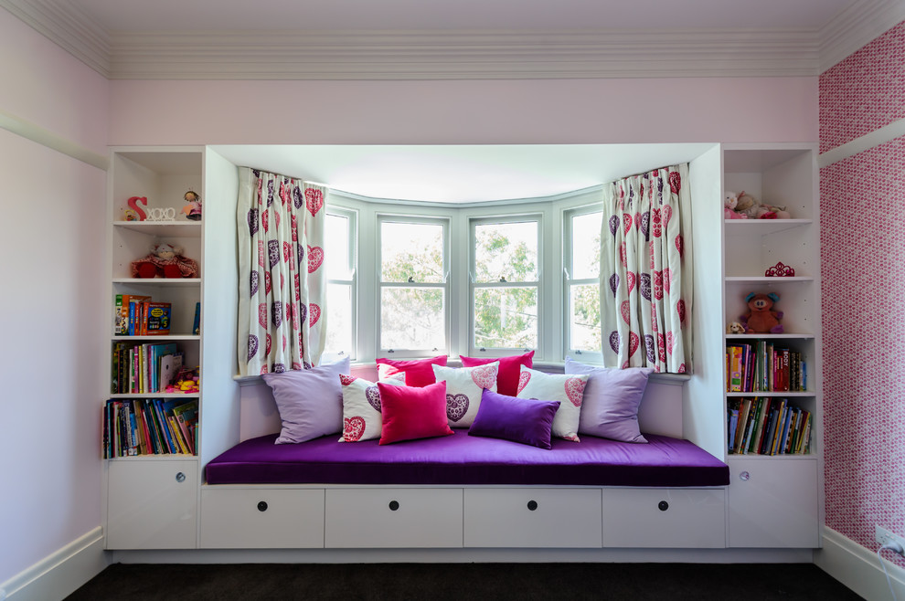 Design ideas for a mid-sized contemporary guest kids' room in Melbourne with pink walls and carpet.