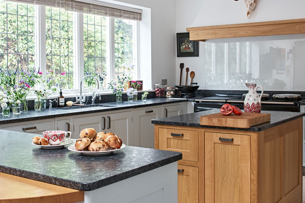 This is an example of a country kitchen in Surrey.