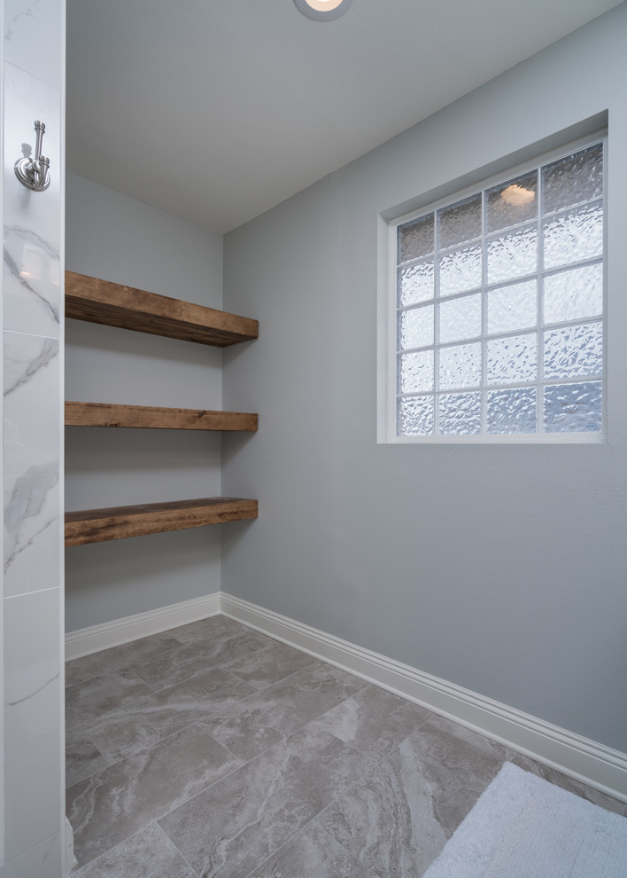 Large transitional master multicolored tile and mosaic tile porcelain tile double shower photo with gray walls, an undermount sink and quartz countertops