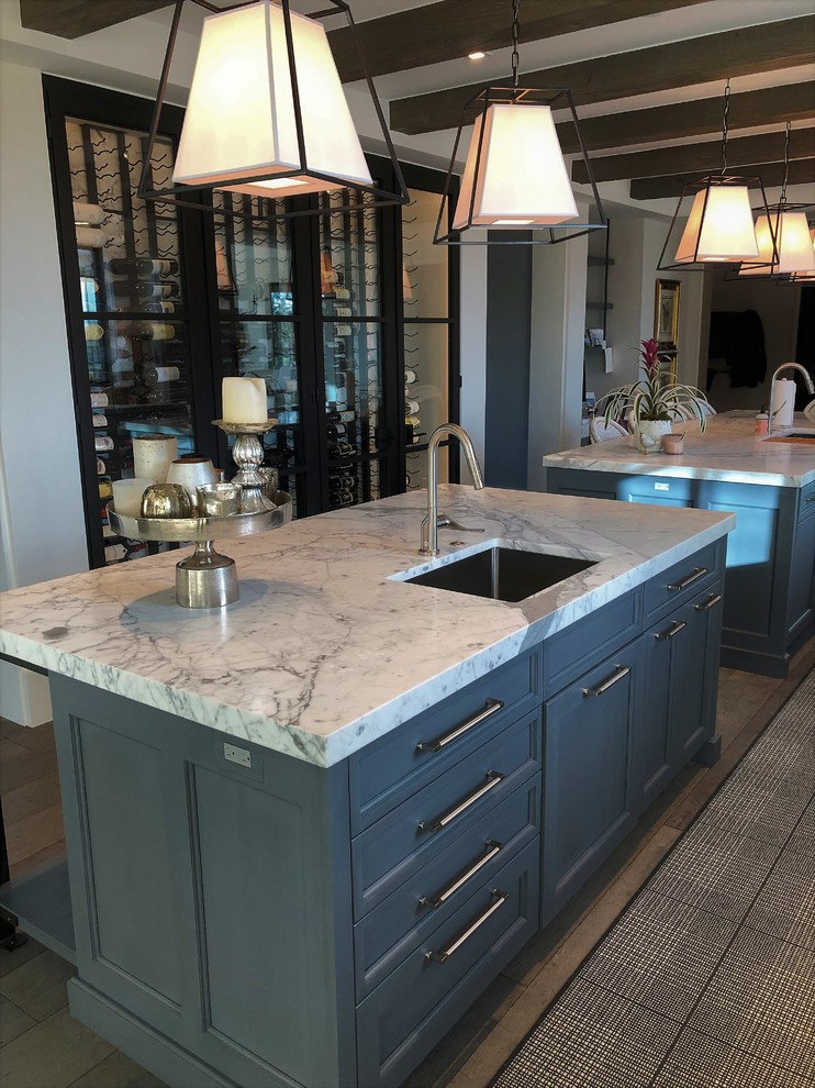Example of a transitional kitchen design in Denver