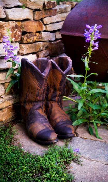 Inspiration for a small rustic partial sun backyard concrete paver retaining wall landscape in Denver.