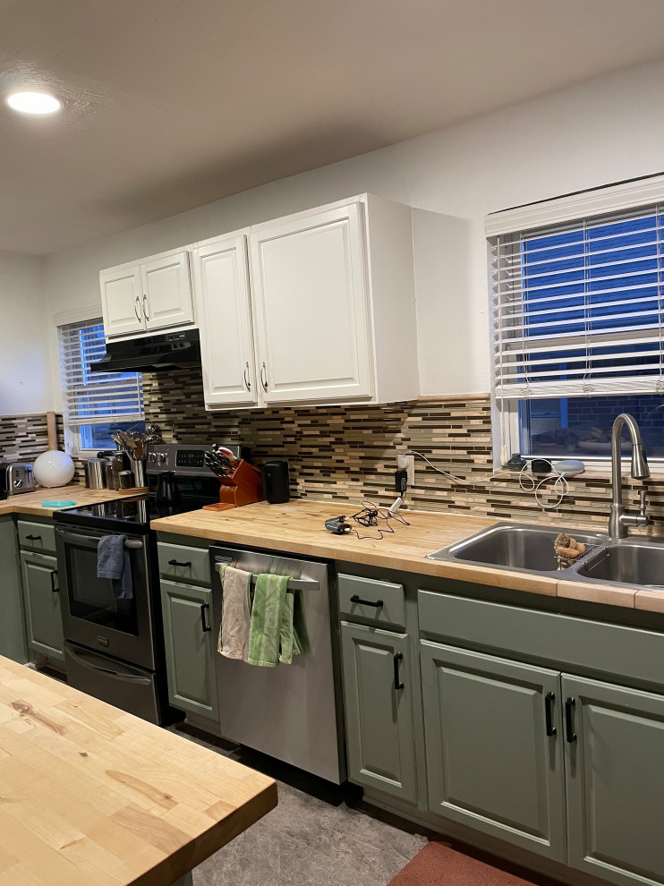 Example of a transitional kitchen design in Denver