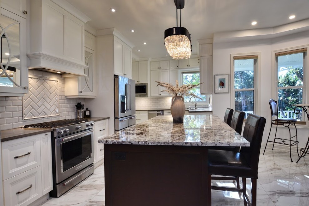 Example of a transitional kitchen design in Toronto