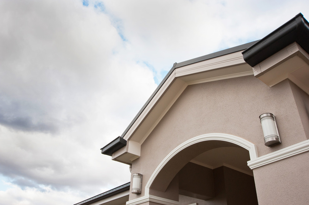 Contemporary entryway in Melbourne with grey walls.