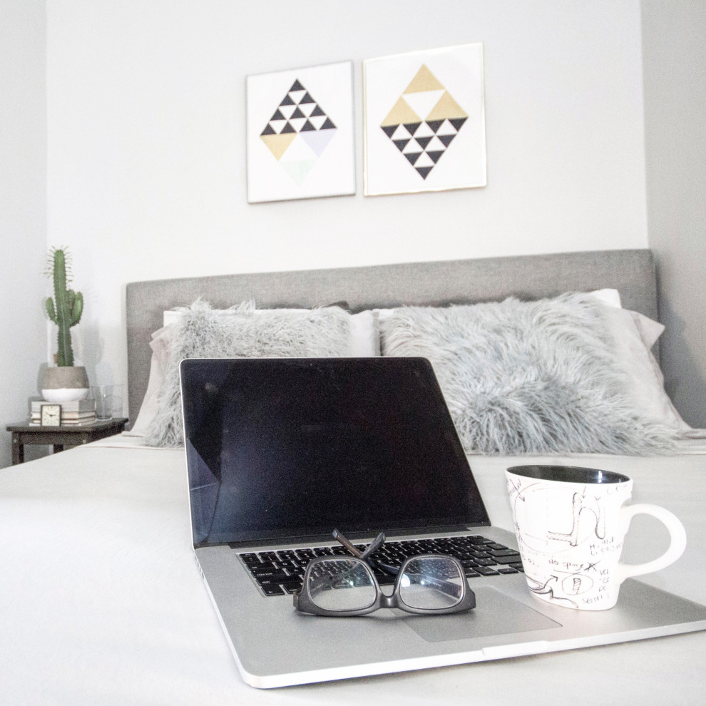 Here, shades of gray take on a warm aesthetic with layers of textile and light