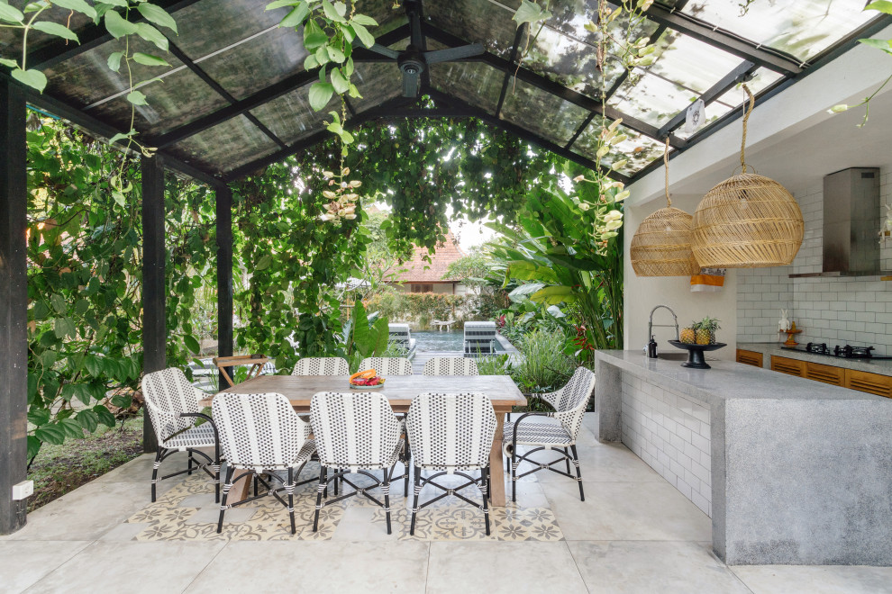 Inspiration for a contemporary patio in Los Angeles with an outdoor kitchen and a gazebo/cabana.