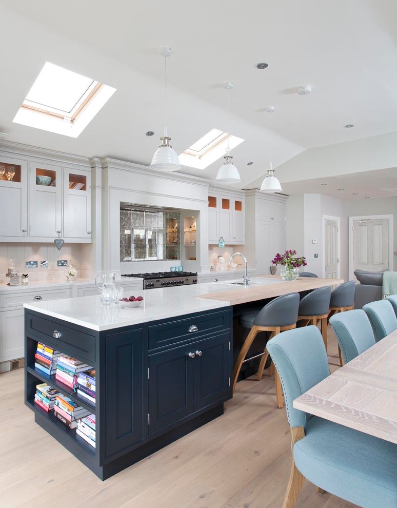 Example of a transitional kitchen design in Dublin