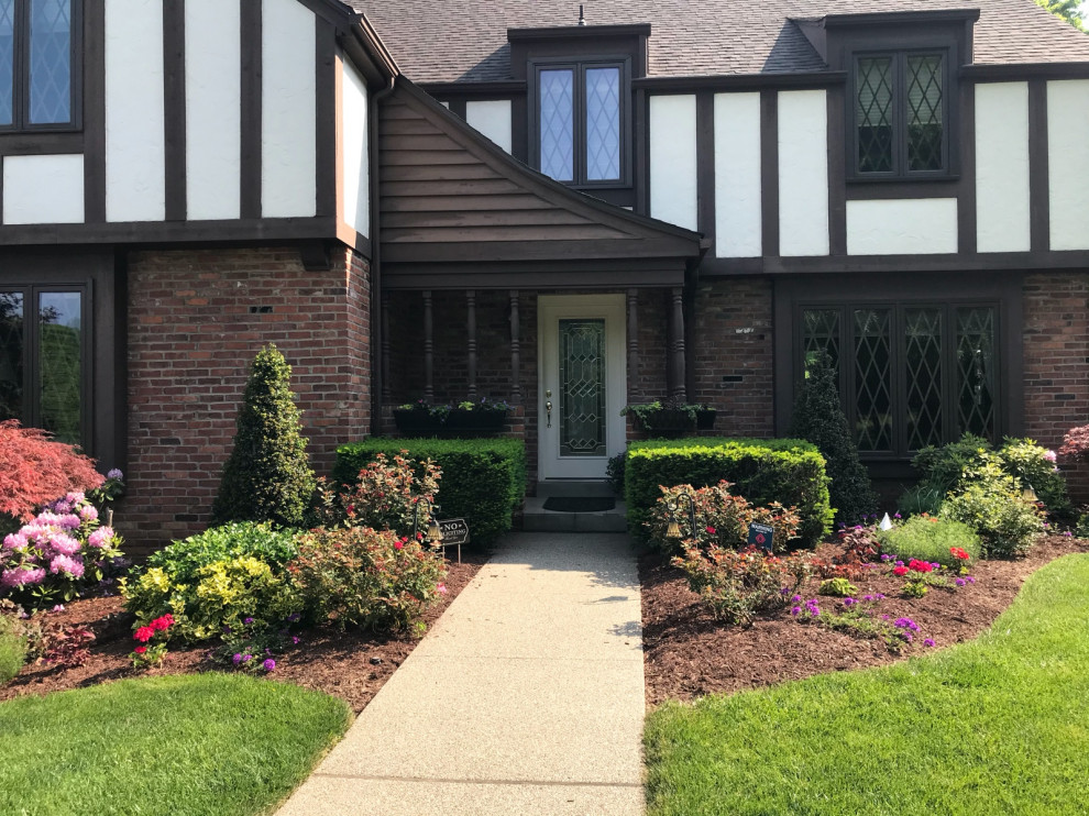 Replace large shrubs with smaller plants