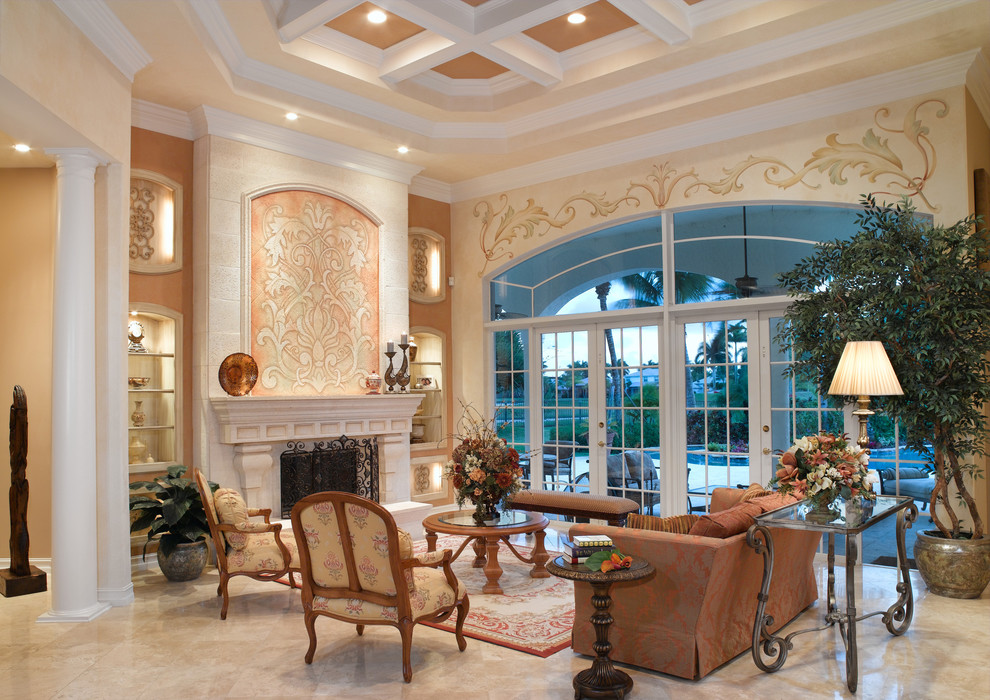 Photo of a mediterranean living room in Miami with beige walls, no tv and marble floors.