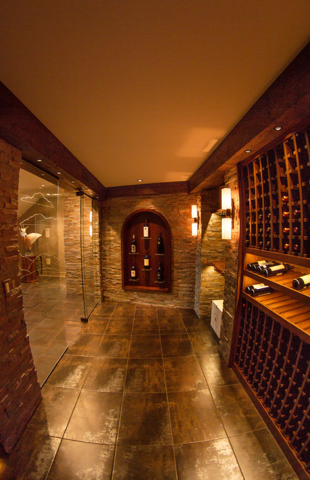 Inspiration for a contemporary wine cellar in Omaha.