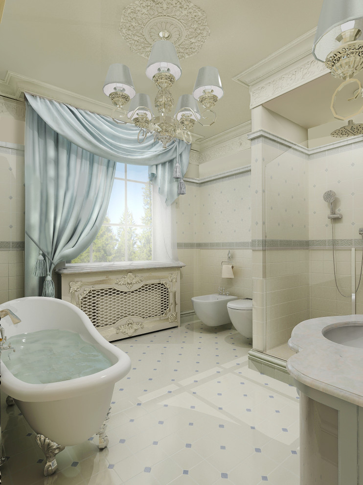Пример оригинального дизайна: ванная комната среднего размера в классическом стиле с фасадами с выступающей филенкой, серыми фасадами, биде, бежевой плиткой, керамической плиткой, бежевыми стенами, мраморным полом, мраморной столешницей, бежевым полом, белой столешницей, напольной тумбой и многоуровневым потолком