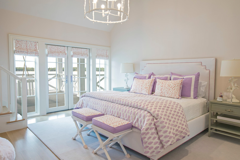 Design ideas for a transitional bedroom in Dallas with pink walls, medium hardwood floors and brown floor.