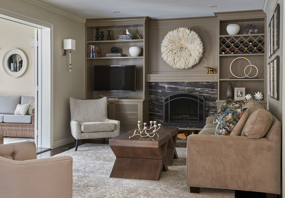 This is an example of a mid-sized contemporary enclosed family room in Toronto with beige walls, dark hardwood floors, a standard fireplace, a stone fireplace surround, a freestanding tv and brown floor.
