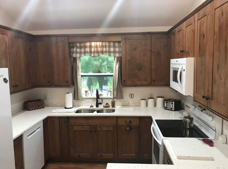 Example of a transitional kitchen design in Miami