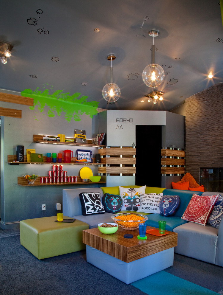 This is an example of an eclectic gender-neutral kids' room in Other with multi-coloured walls and carpet.