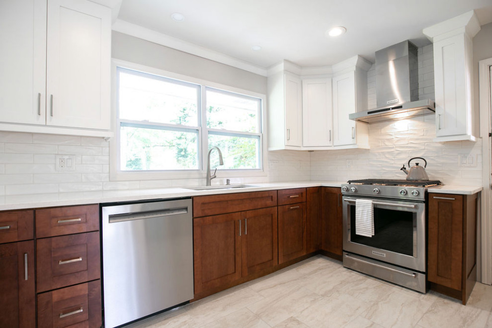Inspiration for a transitional kitchen remodel in Atlanta with white cabinets and quartz countertops