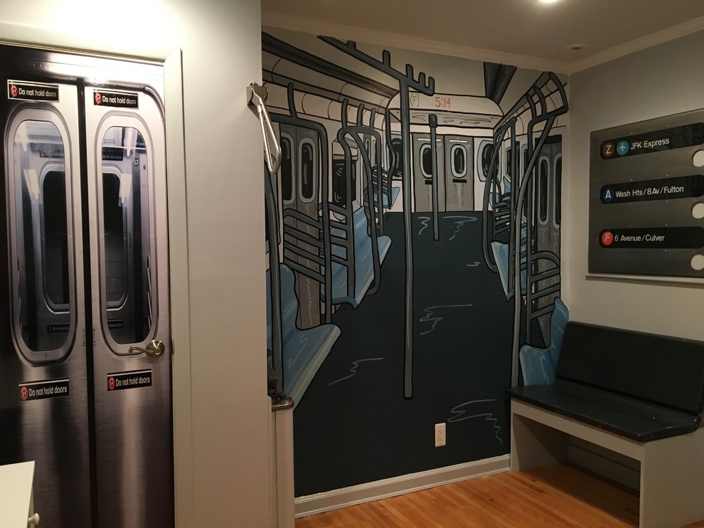 This is an example of a mid-sized modern kids' room for boys in New York.