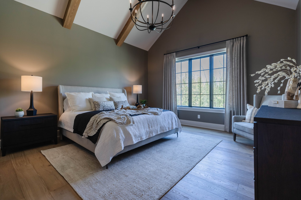 Example of a transitional bedroom design in Cleveland