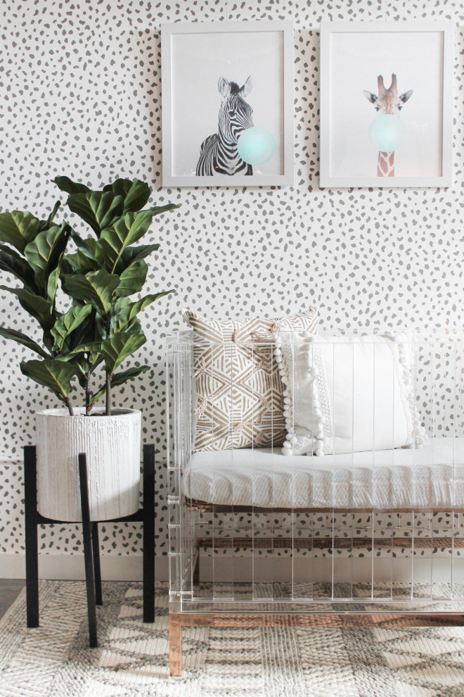 Inspiration for a contemporary gender-neutral nursery in Miami with grey walls.